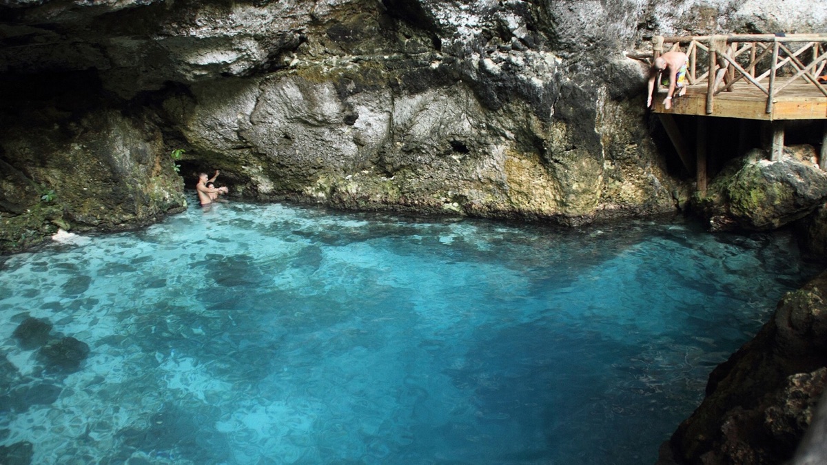 Blue-water lagoon inside Hoyo Azul in Cap Cana